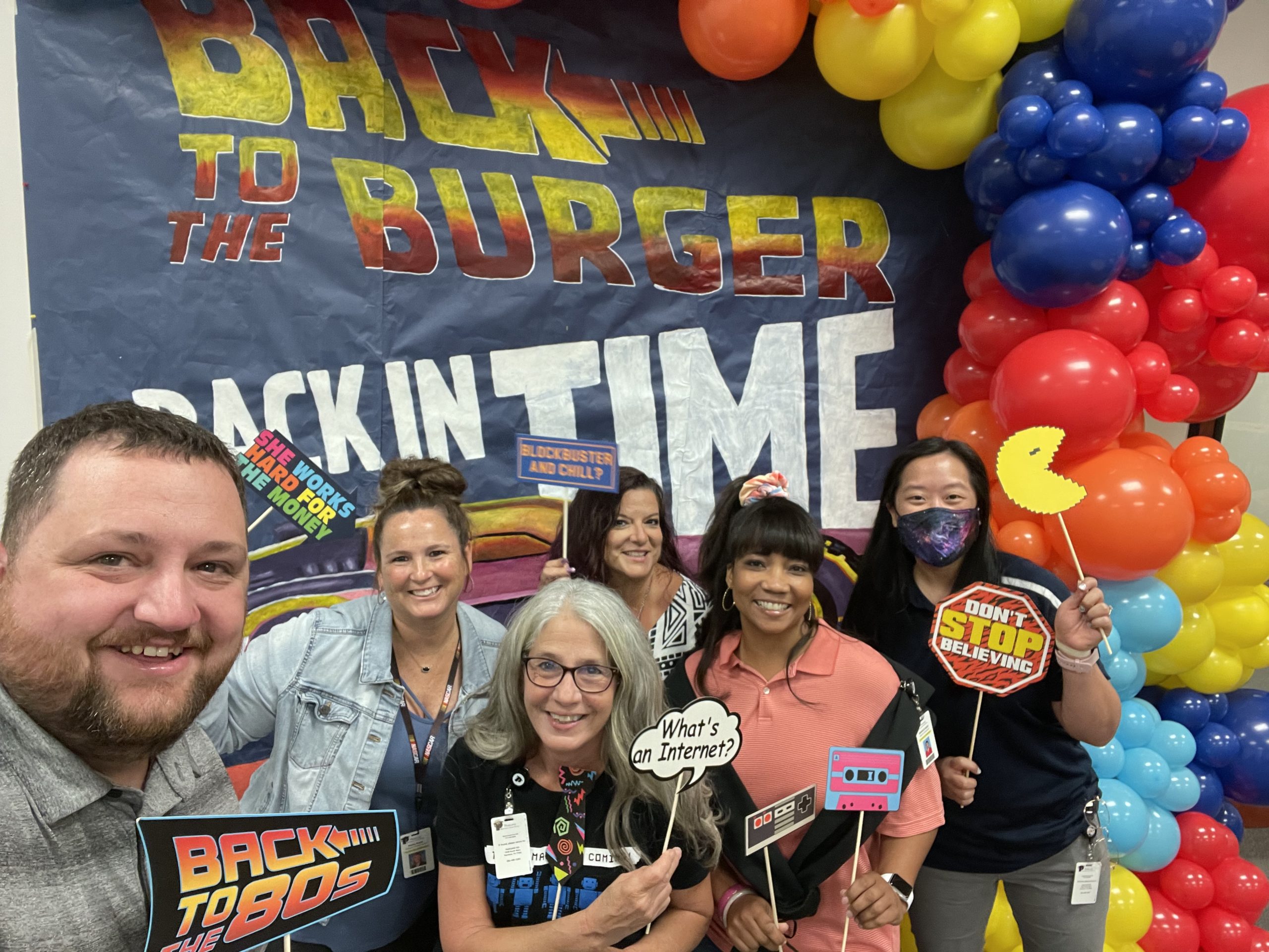 Educational Technology Specialists in Pearland ISD posing for a "back in time" picture for the start of the school year.